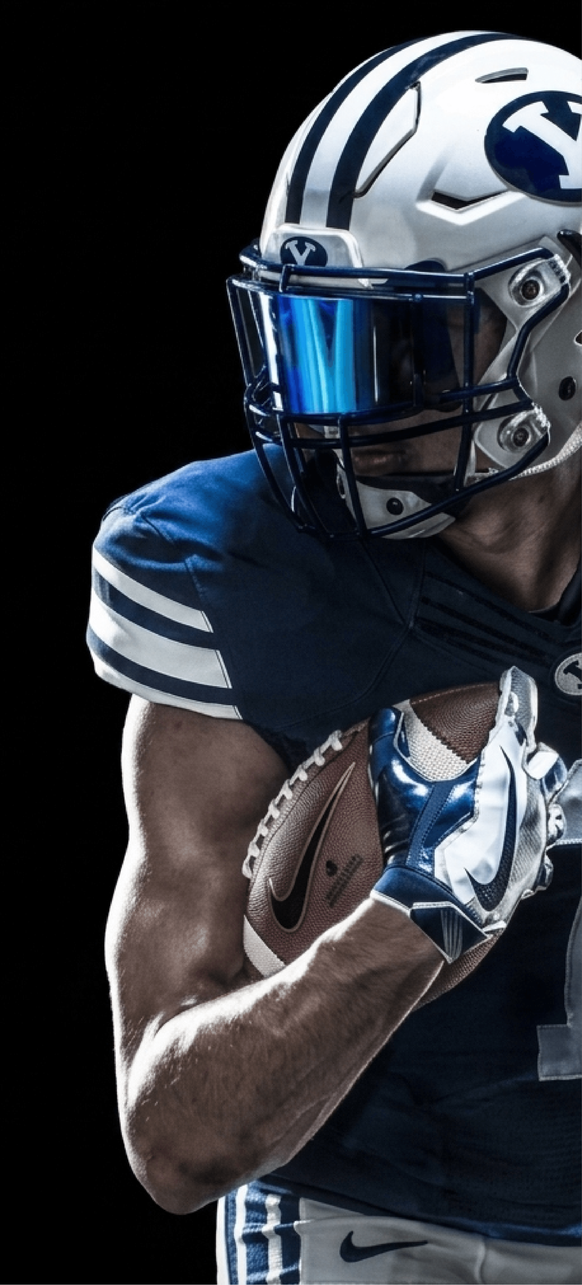 Football player holding a football